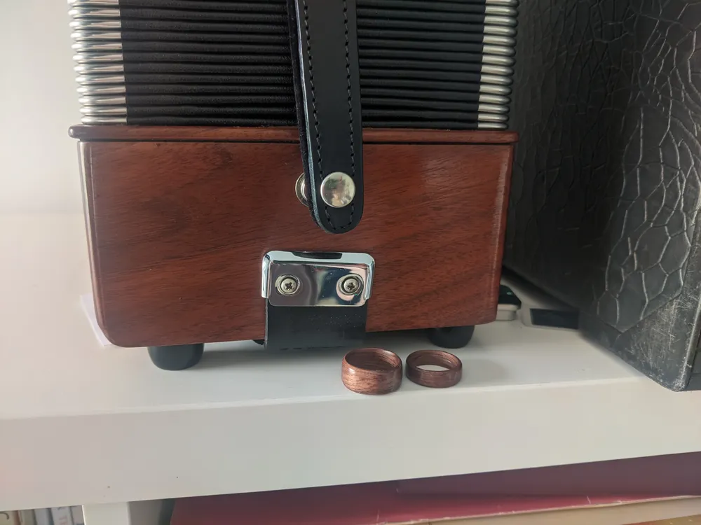 We made them out of American Walnut, to match the melodeon James built.